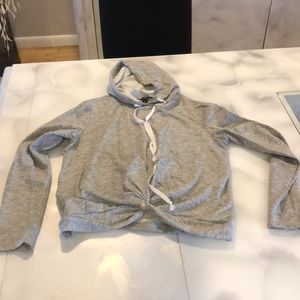 Grey sweatshirt with knotted tie and strings